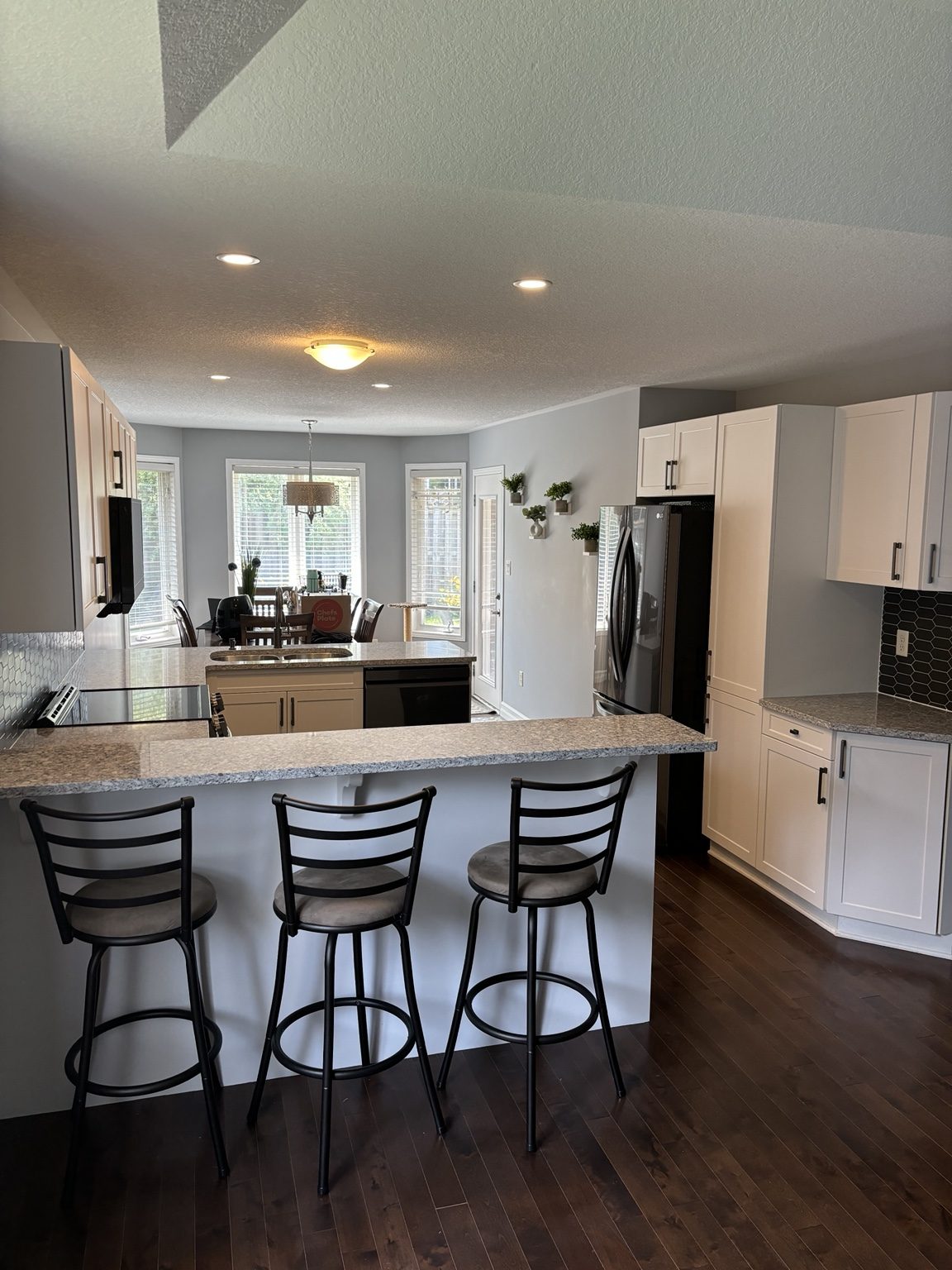 Finished kitchen renovation by Hekman Home Services Inc.
